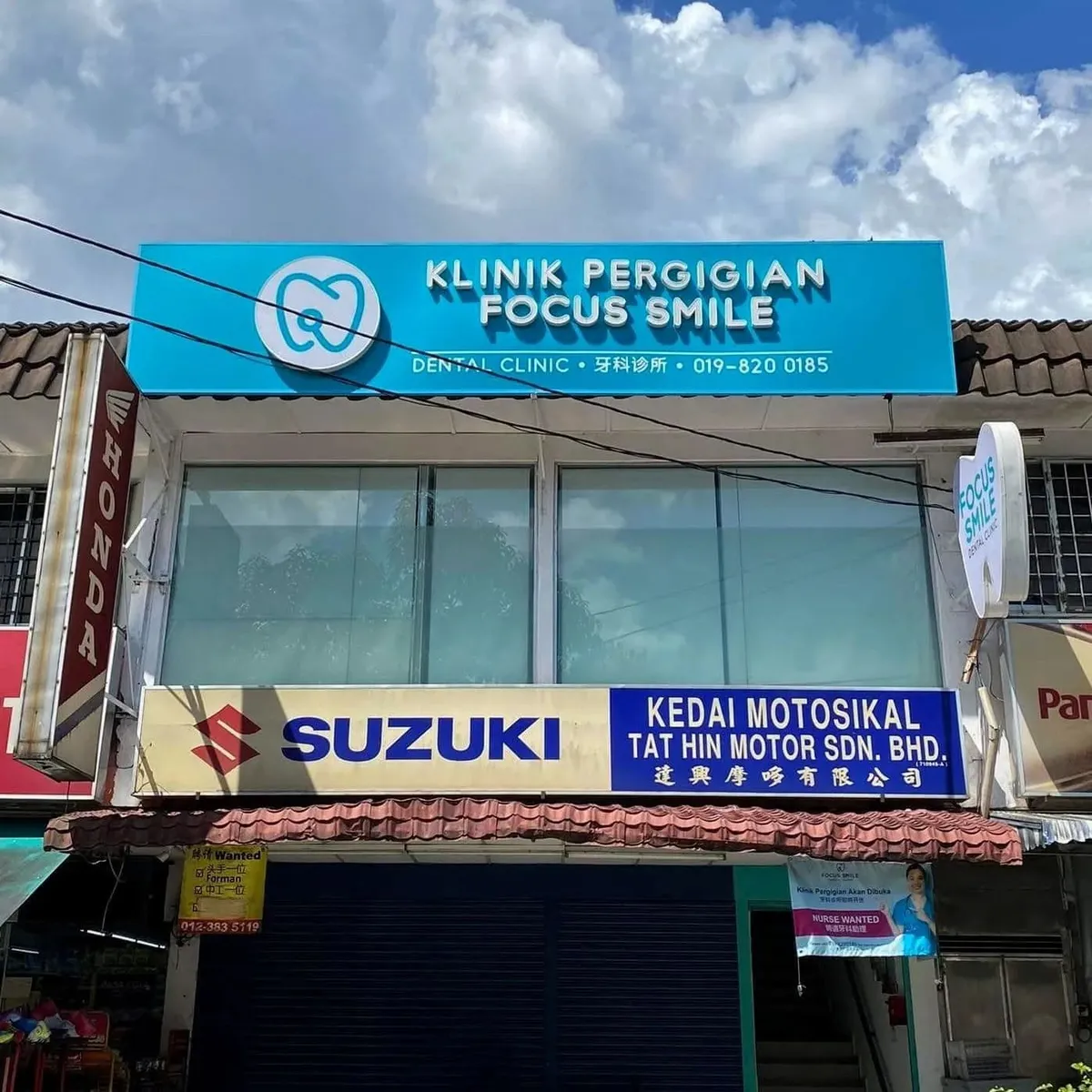 Klinik Pergigian Focus Smile signboard above the shop lot in Taman Putra, Ampang